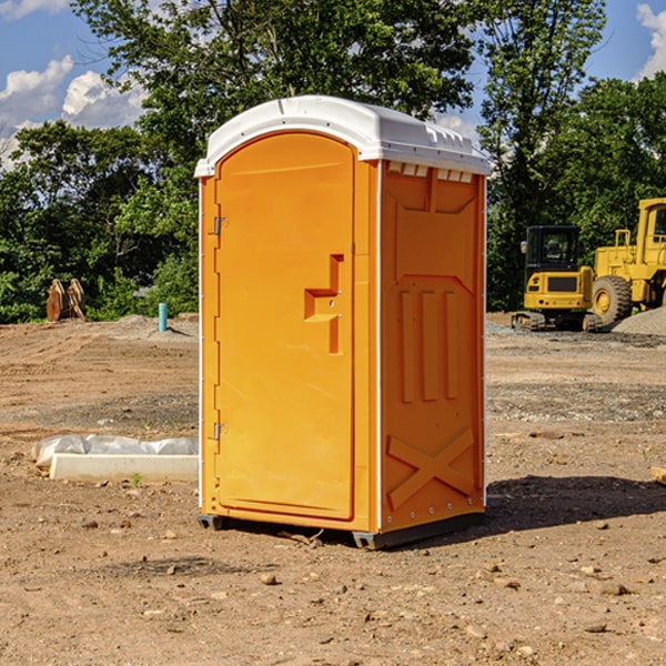 what is the cost difference between standard and deluxe portable toilet rentals in Clay County